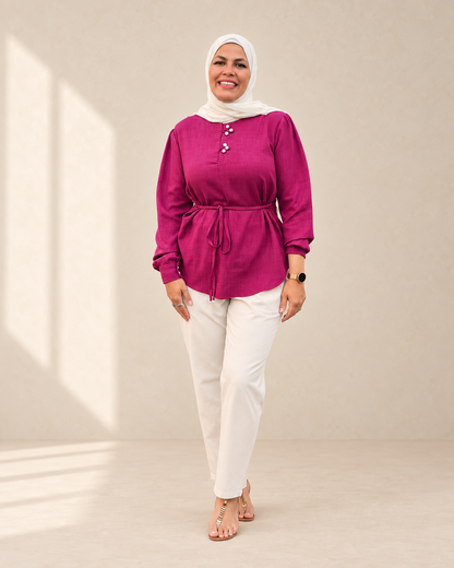 Fuchsia tie-waist linen blouse on model